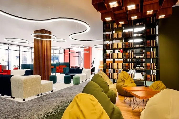 High capacity office workspace with structured seating and acoustic planning